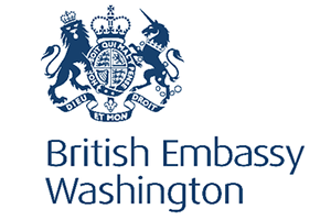 The British royal coat of arms of a lion and a unicorn, with the words, British Embassy Washington