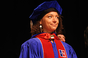 Student receives her PhD at American University commencement ceremonies.