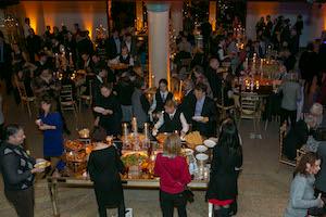 A crowd gets catering at the Embassy.