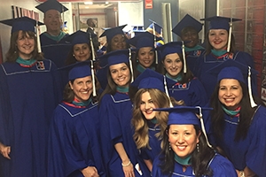 Students from the first graduating class for the online Public Administration and Policy program.