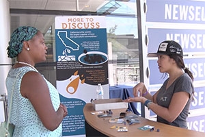 two women talk outside Newseum