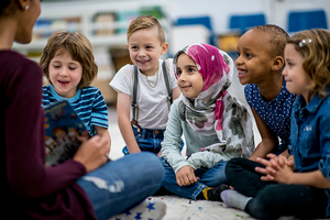 students at school listening to teacher