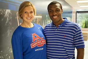 O'Keefe, blonde and in an AU eagles t-shirt, smiles beside Manley, who wears a blue polo.