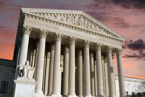 The Supreme Court building during twilight hours.