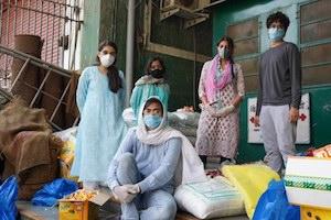 Group of students in masks on food truck