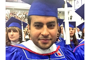 Student in commencement regalia