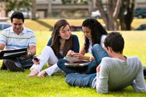 Students outside on a lawn