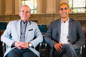 Kogod professors Bob Sicina and Ayman Omar sitting together and smiling.