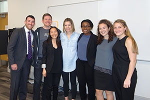 Group of students with representatives from CAVA