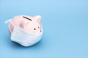 Piggy bank in a face mask.