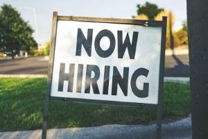 A now hiring sign.