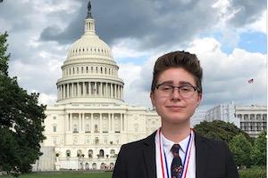 Lee Clyne headshot in front of Capitol Building