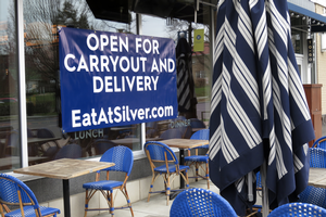 Open for carryout and delivery sign at Silver