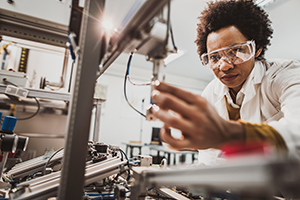 Woman using lab equipment