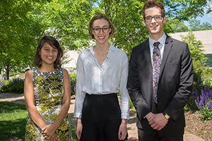  outstanding scholarship winners standing in the quad