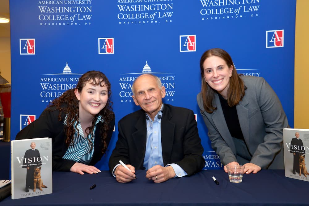 Judge David Tatel with the two students that interviewed him. 