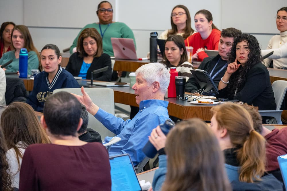 Group of people discussing the US Actions in Venezuela.